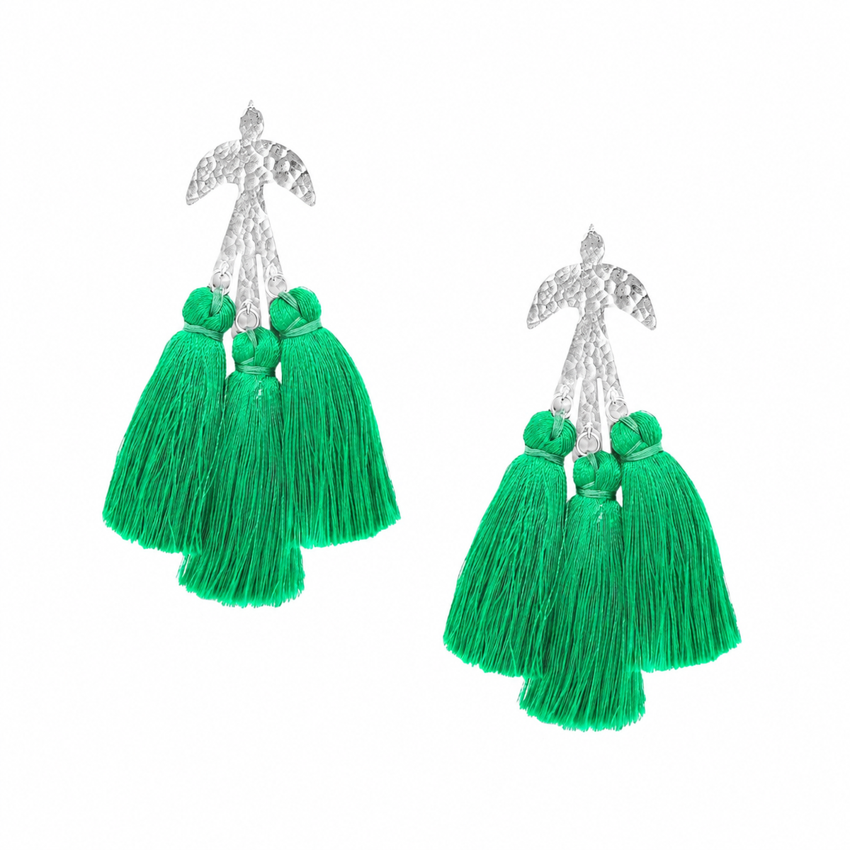 A pair of dangle earrings featuring bright green tassels and hammered effect parakeet bird, displayed on a solid white background.