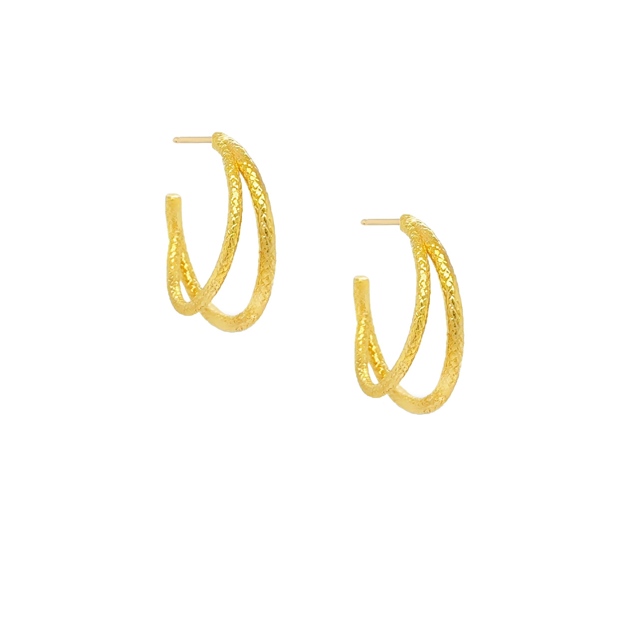 Gold double sun ray hoop earrings with intricate texture and double hoop design, perfect for stylish outfits.