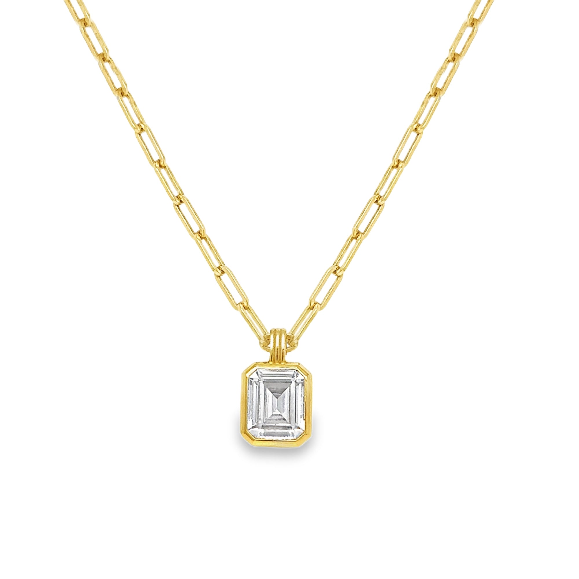 Gold emerald cut cz pendant featuring a large faceted cubic zirconia on a gold chain, perfect for any occasion.