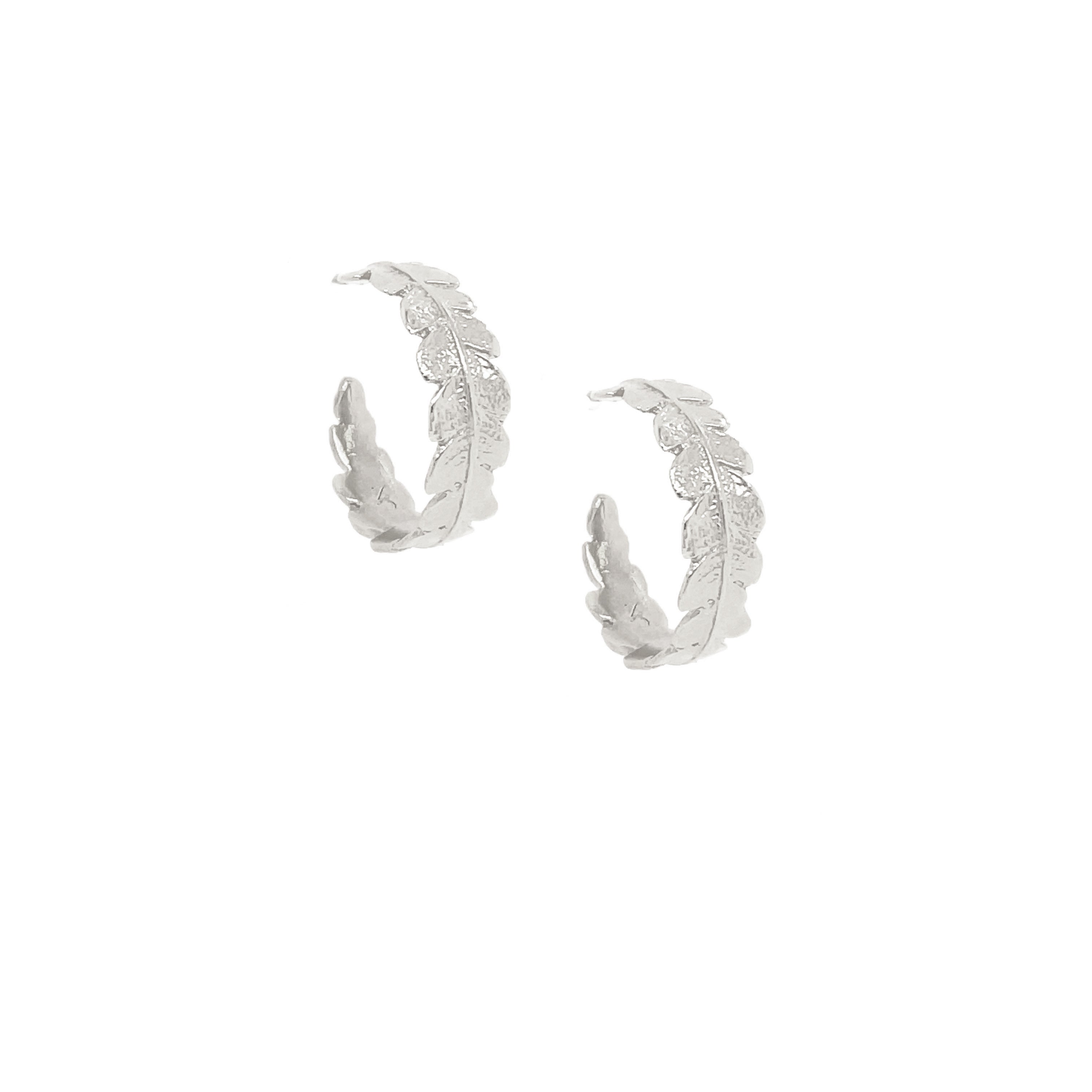 Silver fern hooped round in an earring 