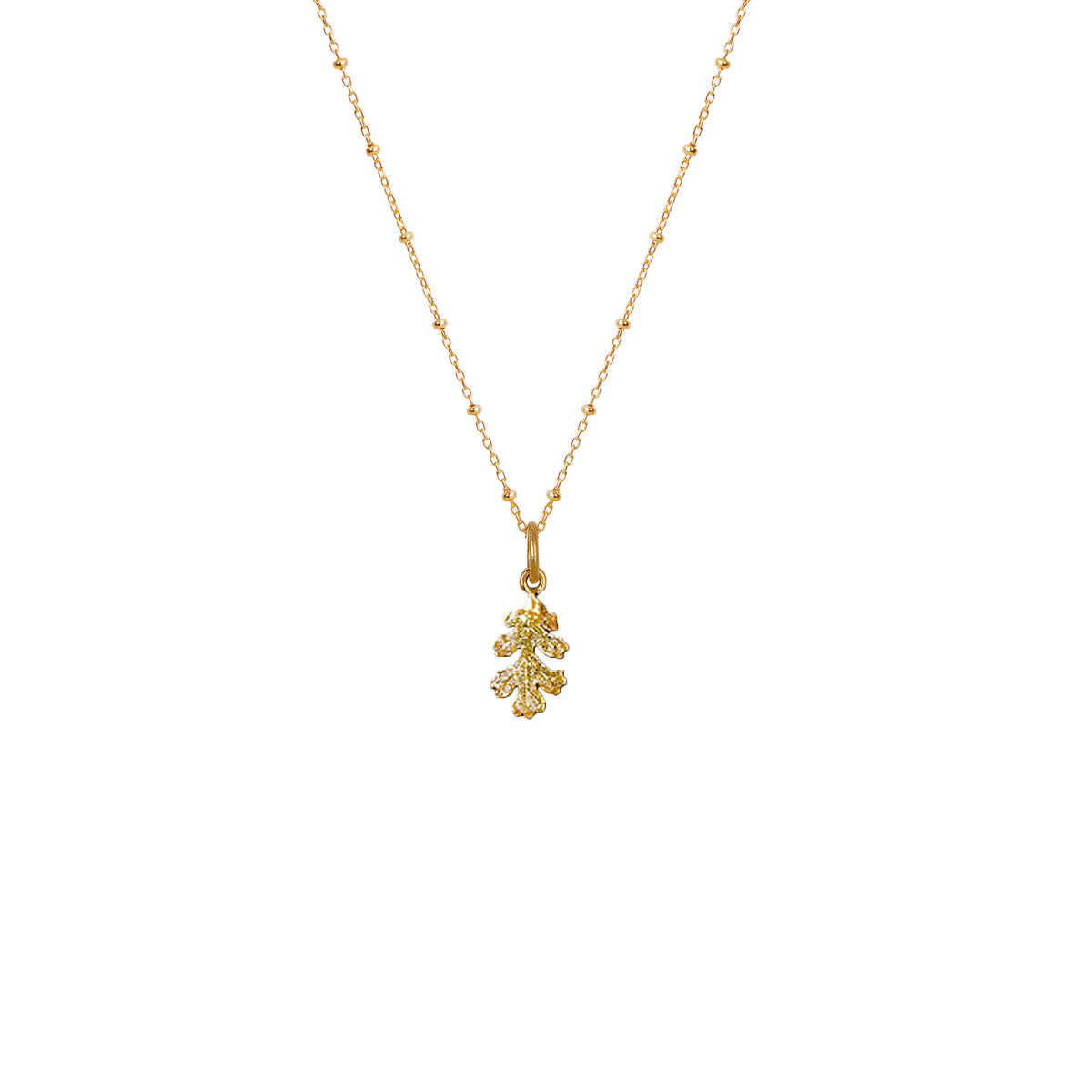 Gold little oak leaf pendant on an 18-inch satellite chain, symbolizing strength and wisdom.