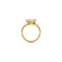 A yellow gold ring with a pear diamond gemstone in a bezel setting, shown against a plain white background.