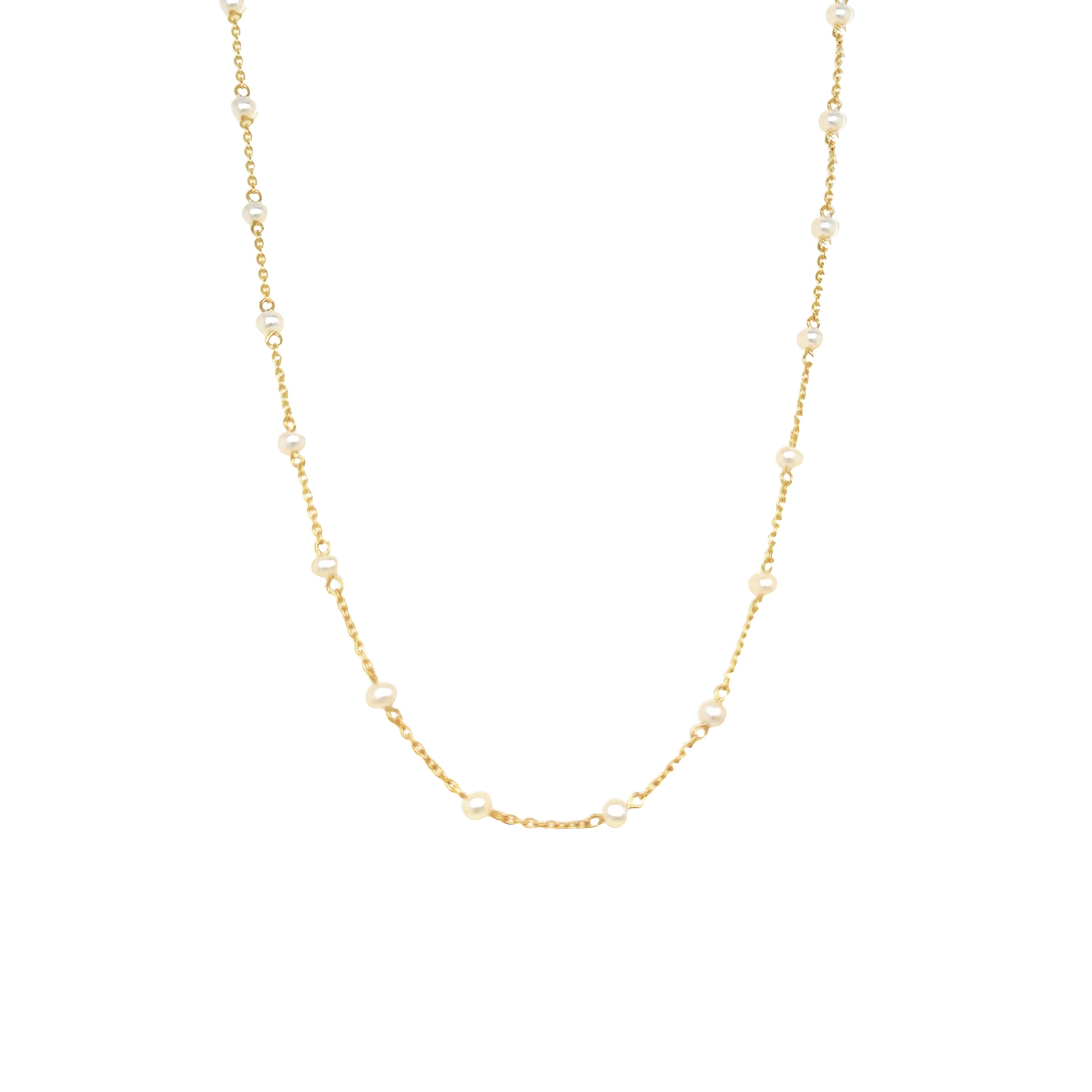 Pearl satellite chain necklace featuring baroque pearls on a gold plated chain, perfect for layering.