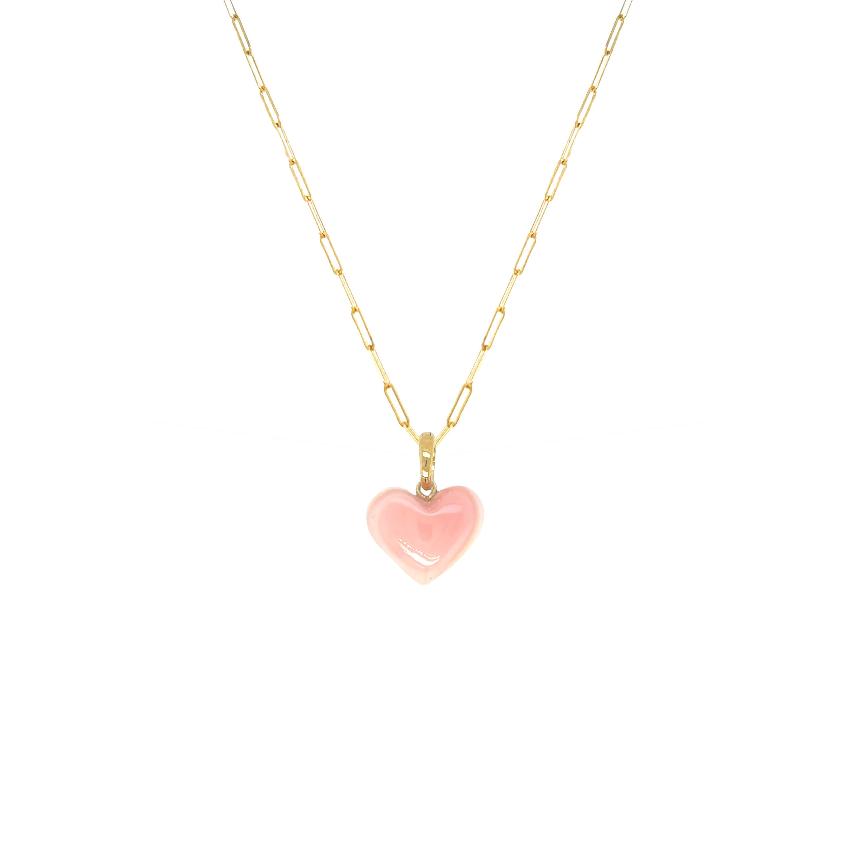 Pink shell love heart pendant necklace on a gold paperclip chain, perfect for layering or solo wear.