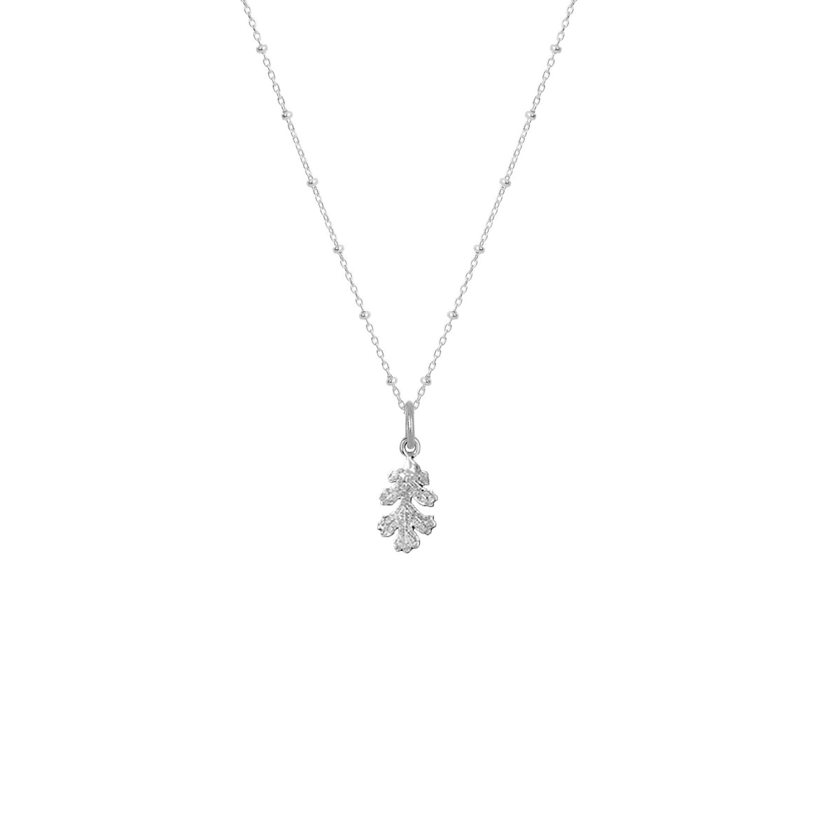A delicate silver necklace with a small oak leaf-shaped pendant charm, shown against a plain white background.