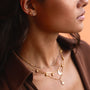 Gold Starry Night Stud Earrings worn by a model showcasing elegant gold jewelry.