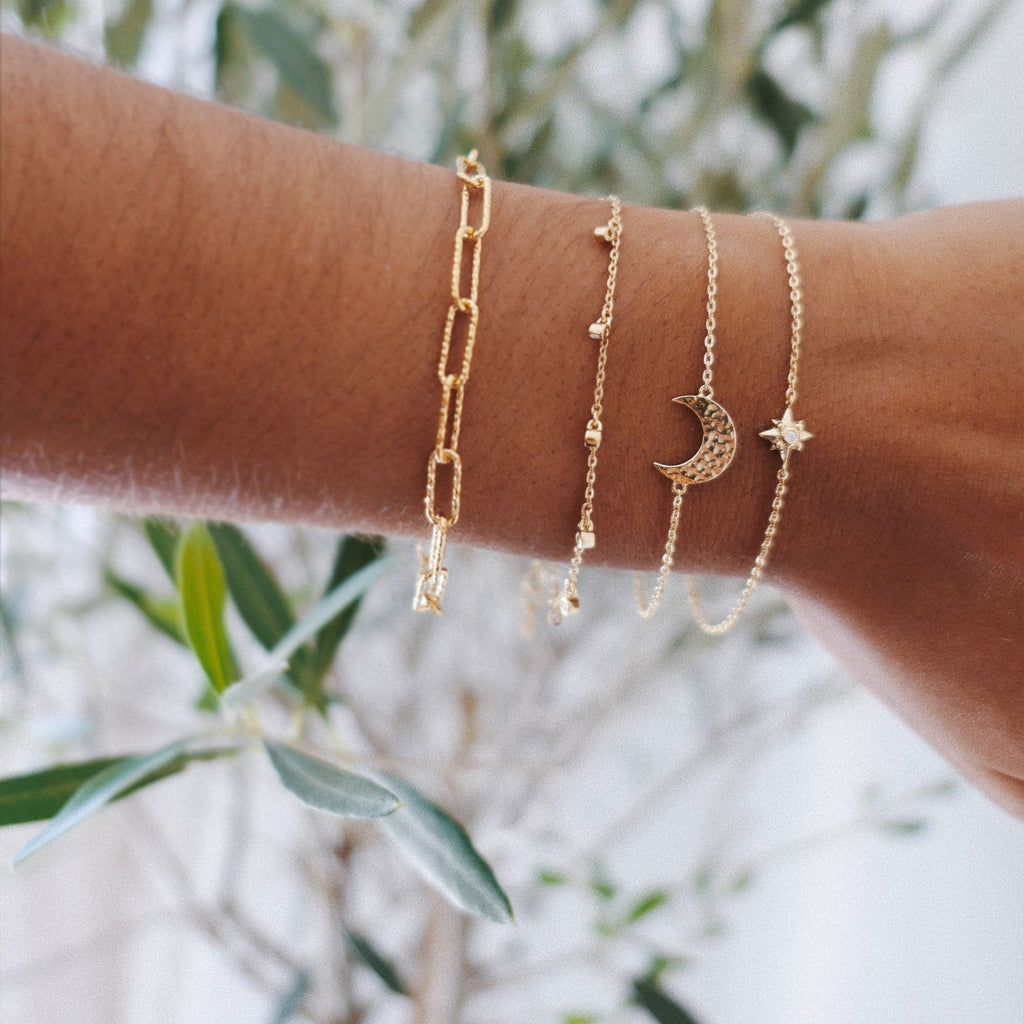 Gold Glitter Chain bracelet, Cosmic Bracelet, Moon Bracelet and Star Bracelet Stacked | Zoraida London Jewellery