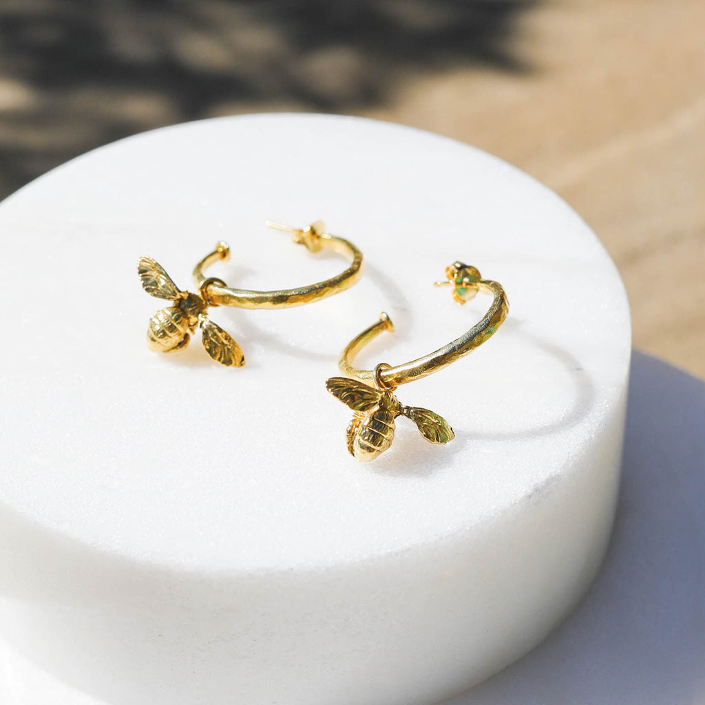 Little Bee Hammered Hoop Earrings with sliding charms.