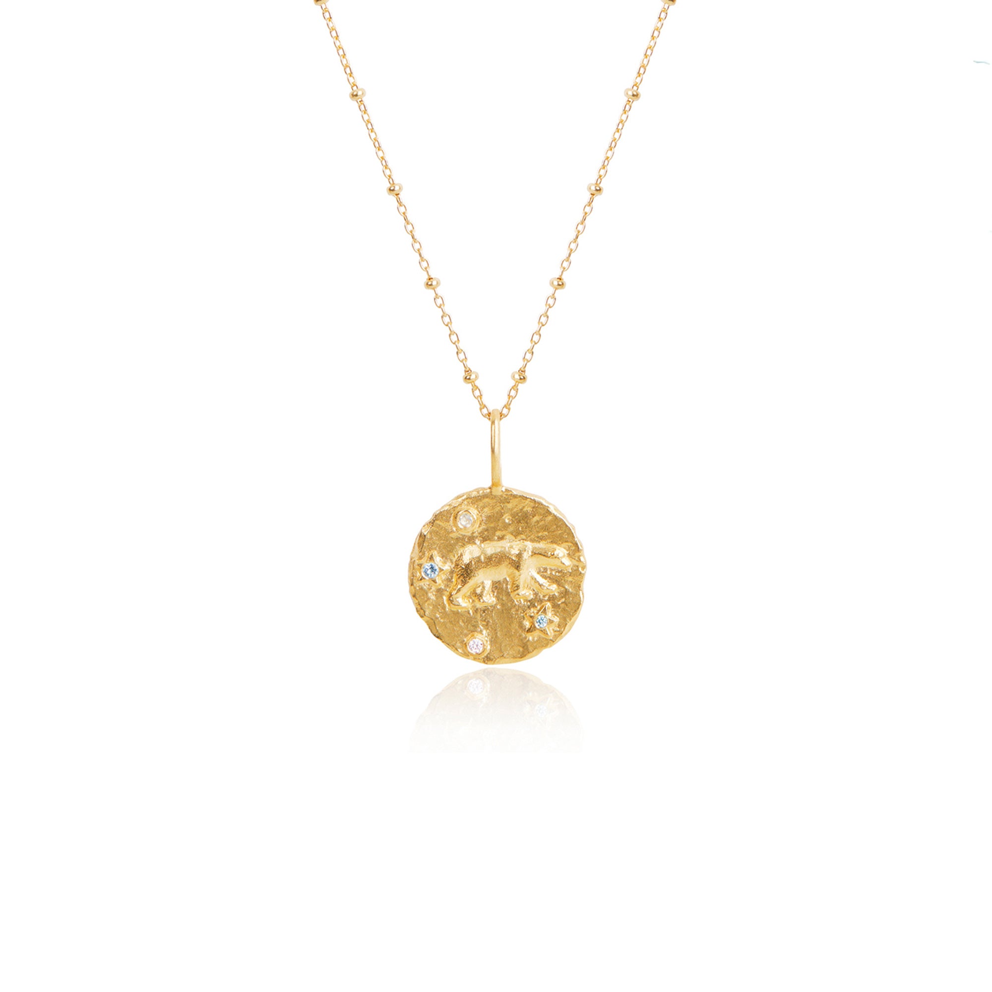 Gold Ursa Major constellation pendant featuring a 19mm disc with jewels, symbolizing courage and strength.