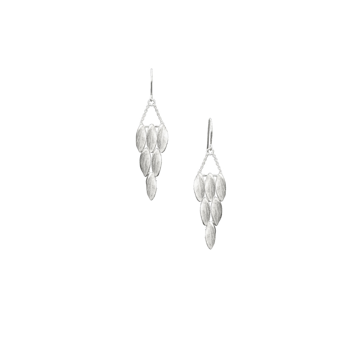 A pair of silver wing-shaped earrings with detailed cascading feathers, attached to hooks for wear.