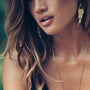 Rocky Barnes wears Catherine Zoraida Gold Wing Earring
