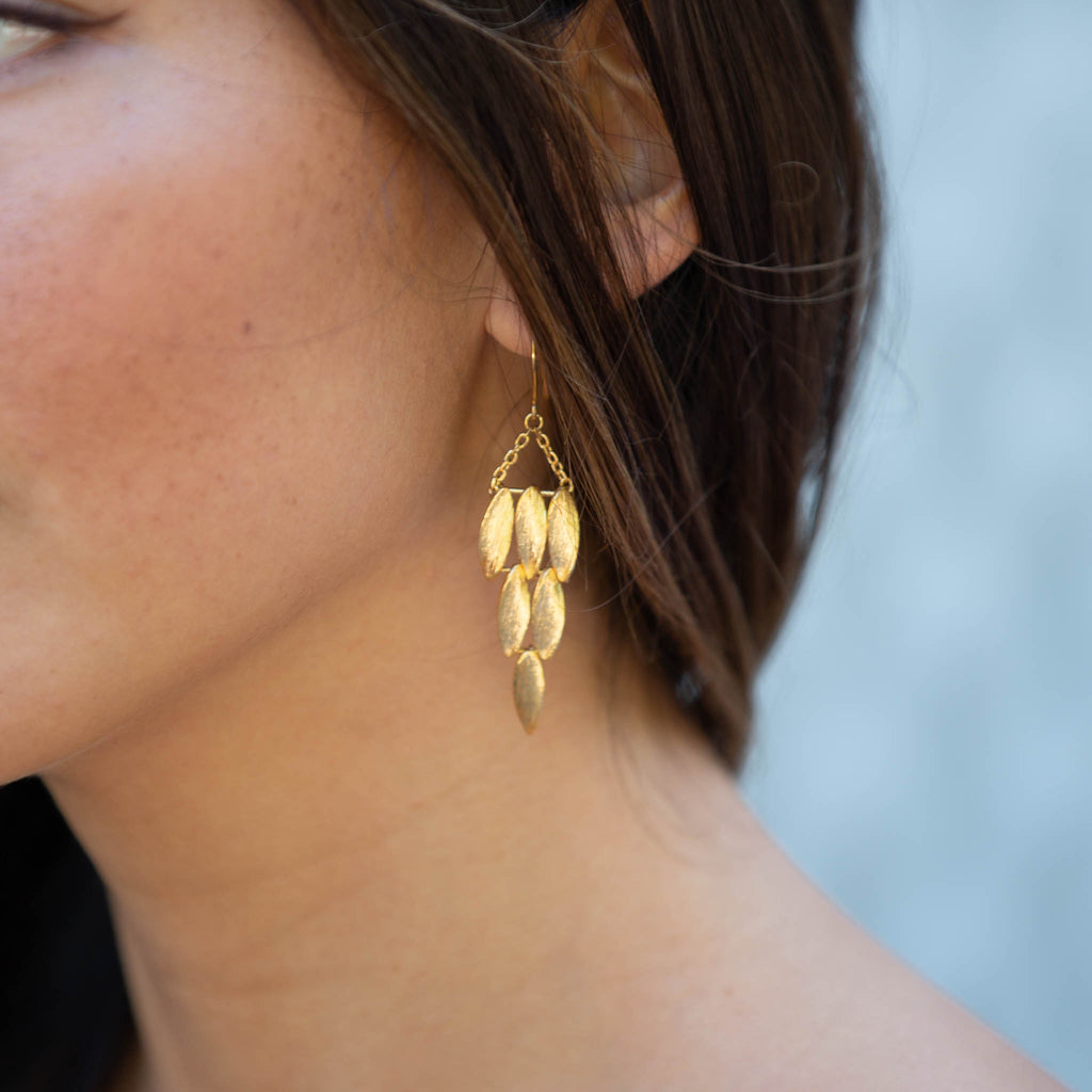 gold wing earrings by british jewellery designer catherine zoraida