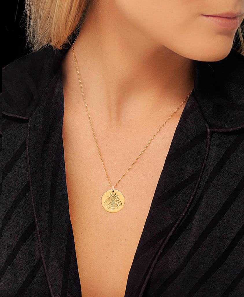 Honeybee disc design necklace worn by blogger Lucy Williams. 